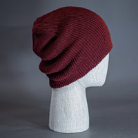 The Burnside Beanie, a burgundy colored, soft slouch knit, blank beanie. Designed by Blvnk Headwear.