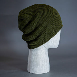 The Burnside Beanie, a military olive colored, soft slouch knit, blank beanie. Designed by Blvnk Headwear.