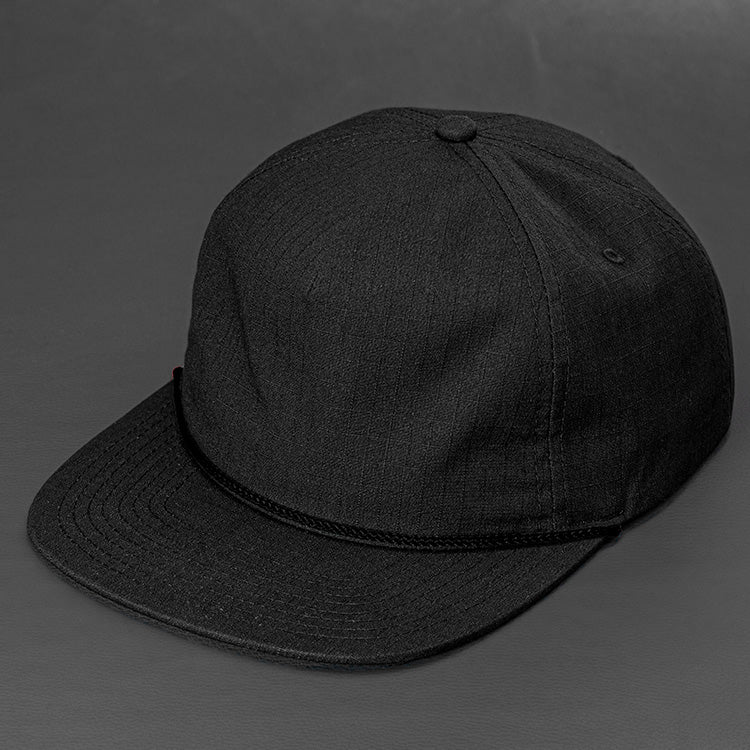 The Ranger unstructured rip stop pinch front blank 5 panel hat in black with a black rope by Blvnk Headwear.