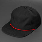 The Ranger unstructured rip stop pinch front blank 5 panel hat in black with a red rope by Blvnk Headwear.