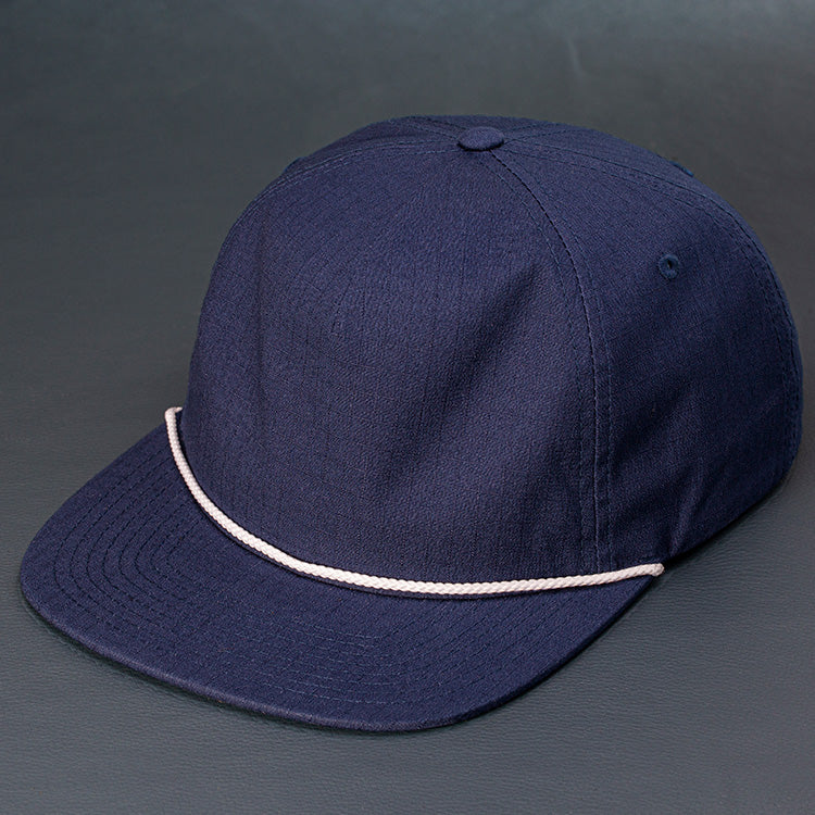 The Ranger unstructured rip stop pinch front blank 5 panel hat in navy with a white rope by Blvnk Headwear.