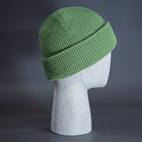 The Waffle Beanie, a sage colored, waffle knit blank beanie. Designed by Blvnk Headwear.