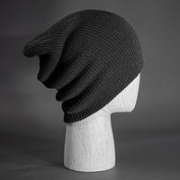 A heather charcoal colored, super slouch knit blank beanie.  Designed by Blvnk Headwear.