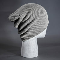 A heather grey colored, super slouch knit blank beanie.  Designed by Blvnk Headwear.