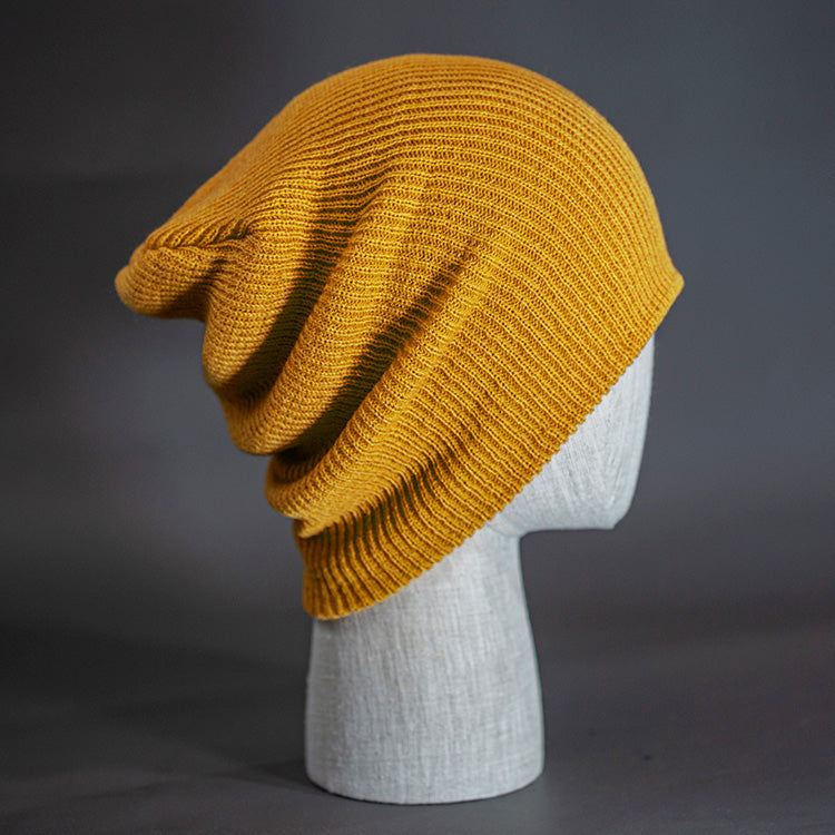 A wheat colored, super slouch knit blank beanie.  Designed by Blvnk Headwear.