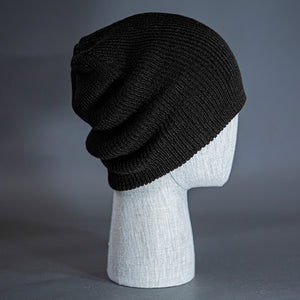 The Burnside Beanie, a black colored, soft slouch knit, blank beanie. Designed by Blvnk Headwear.
