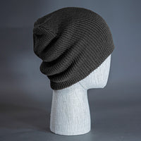 The Burnside Beanie, a heather charcoal colored, soft slouch knit, blank beanie. Designed by Blvnk Headwear.