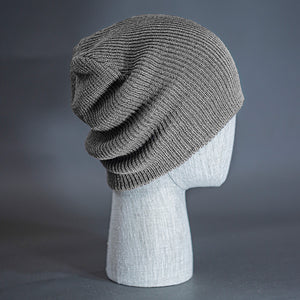 The Burnside Beanie, a heather grey colored, soft slouch knit, blank beanie. Designed by Blvnk Headwear.
