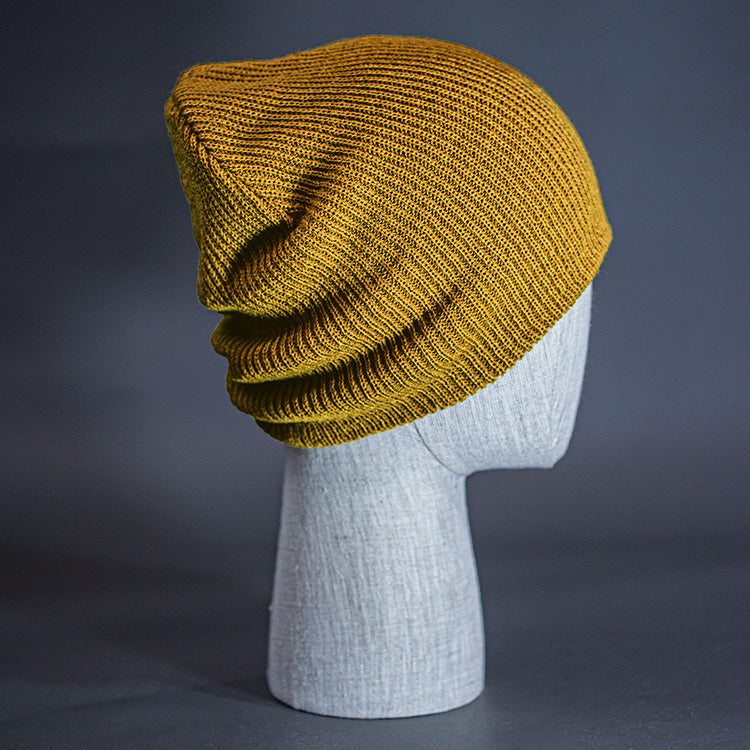 The Burnside Beanie, a wheat colored, soft slouch knit, blank beanie. Designed by Blvnk Headwear.