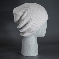 The Burnside Beanie, a white colored, soft slouch knit, blank beanie. Designed by Blvnk Headwear.