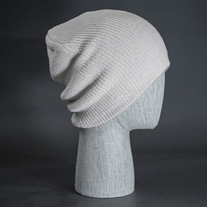 The Burnside Beanie, a white colored, soft slouch knit, blank beanie. Designed by Blvnk Headwear.