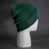 The Hood Beanie, a forest colored, tight knit, mid length blank beanie. Designed by Blvnk Headwear.