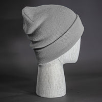 The Hood Beanie, a grey colored, tight knit, mid length blank beanie. Designed by Blvnk Headwear.