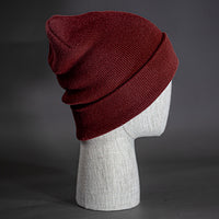 The Hood Beanie, a burgundy colored, tight knit, mid length blank beanie. Designed by Blvnk Headwear.