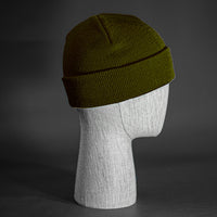 The Longshore Beanie, a loden colored, tight knit, short length blank beanie. Designed by Blvnk Headwear.