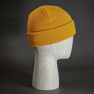 The Longshore Beanie, a wheat colored, tight knit, short length blank beanie. Designed by Blvnk Headwear.