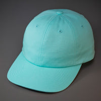An Aruba Blue, Premium Cotton, 6 Panel Crown, Blank Dad Hat.  Designed by Blvnk Headwear.