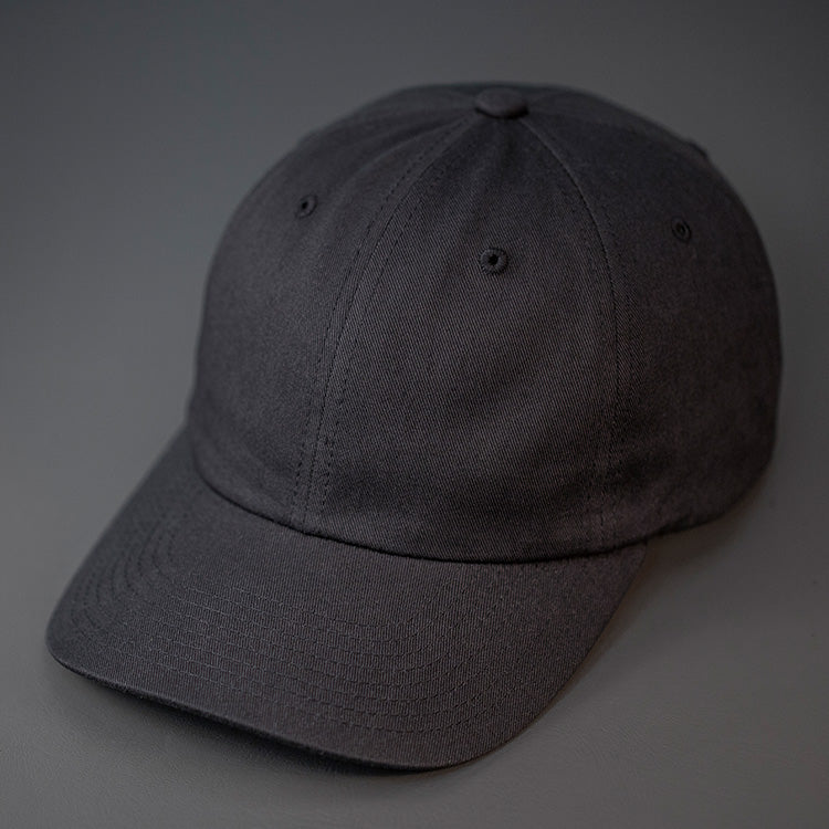 A Black, Premium Cotton, 6 Panel Crown, Blank Dad Hat.  Designed by Blvnk Headwear.