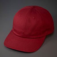 A Pale Maroon, Premium Cotton, 6 Panel Crown, Blank Dad Hat.  Designed by Blvnk Headwear.