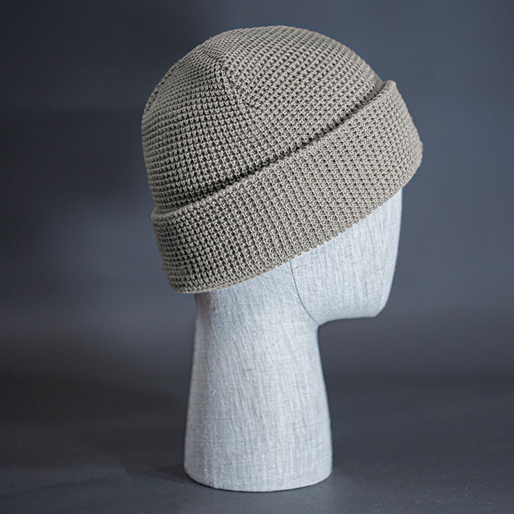 The Waffle Beanie, a stone colored, waffle knit blank beanie. Designed by Blvnk Headwear.