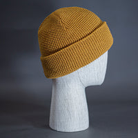 The Waffle Beanie, a wheat colored, waffle knit blank beanie. Designed by Blvnk Headwear.