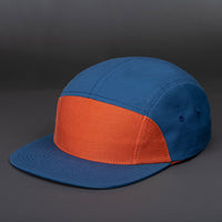 Bowery Blank 7 Panel Camp Hat in Dark Orange and Light Navy by Blvnk Headwear. YOU KNOW