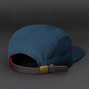 Bowery Blank 7 Panel Camp Hat in Varsity Red and Grayish Navy with Leather Back Strap by Blvnk Headwear. YOU KNOW